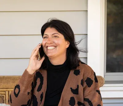 Michelle Murphy on a phone call outside her office